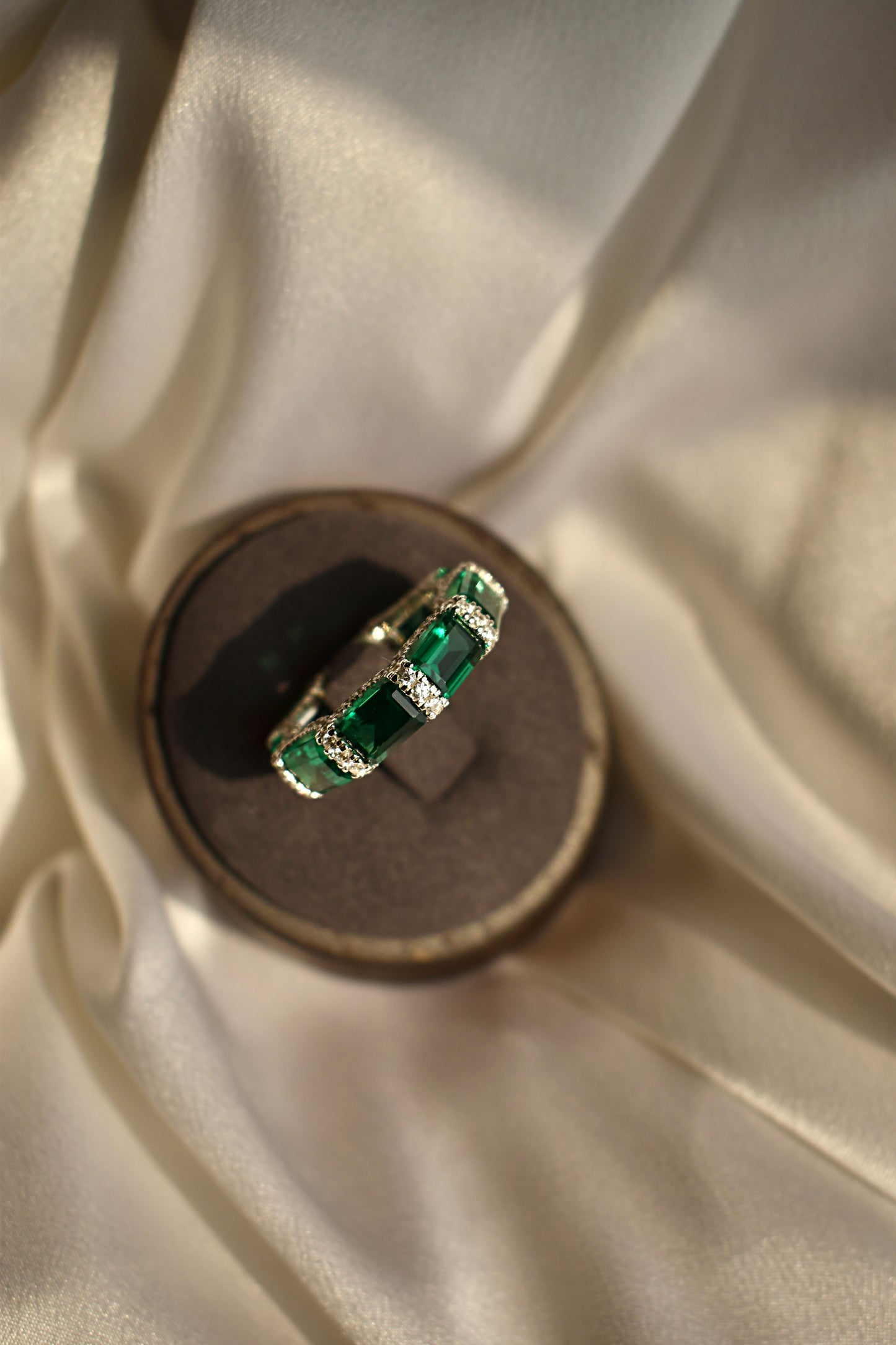 Green Stone Emerald Cut Eternity Band
