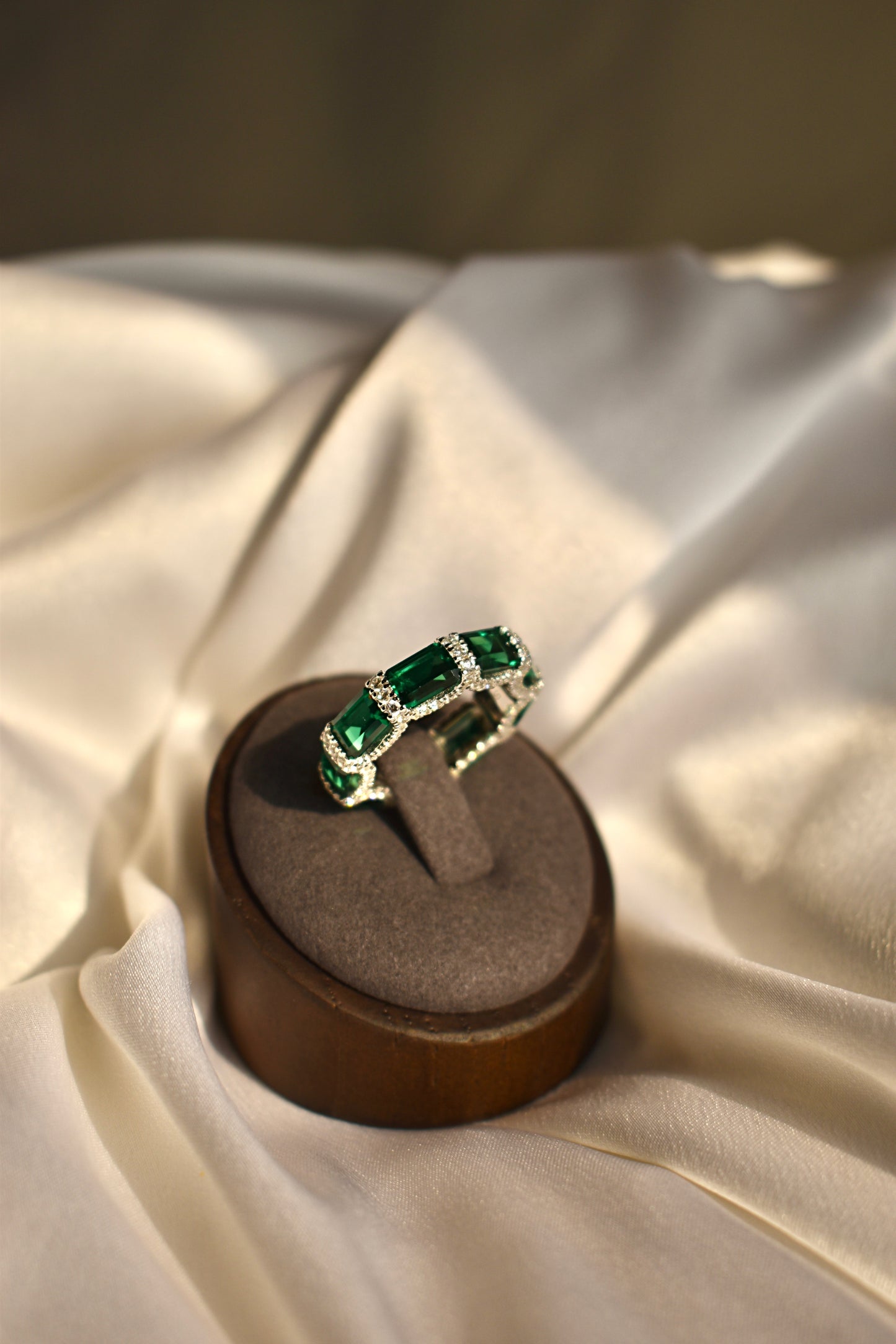 Green Stone Emerald Cut Eternity Band