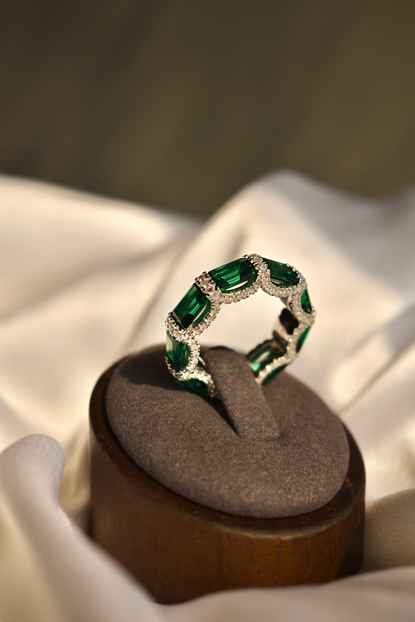 Green Stone Emerald Cut Eternity Band