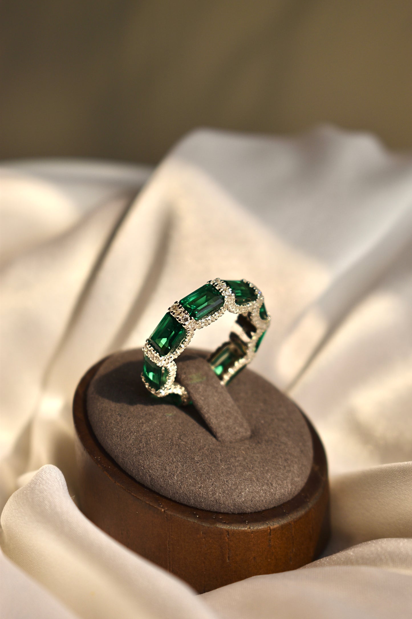 Green Stone Emerald Cut Eternity Band