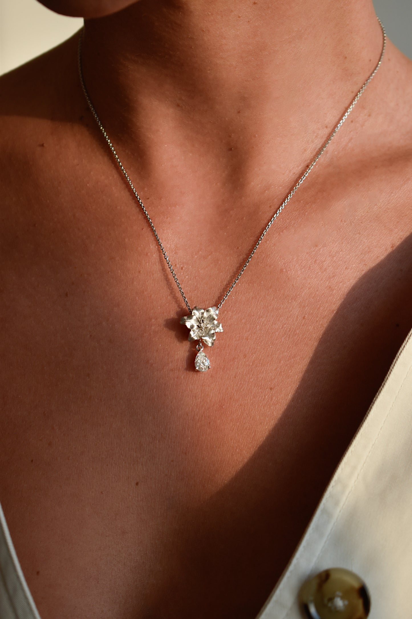 Brushed Silver Rose with Drop Moissanite Pear Shape Necklace